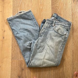 Heavily worn seven jeans wide leg